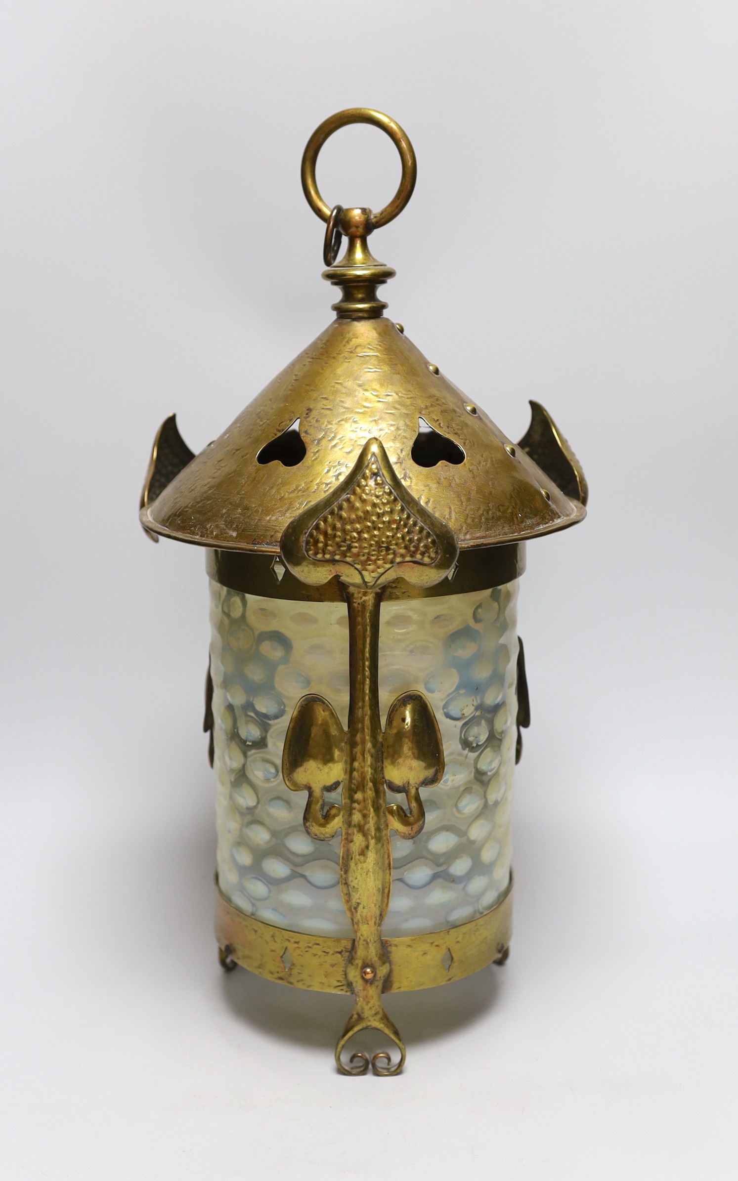 An Art Nouveau brass and vaseline glass hall lantern, 47cm